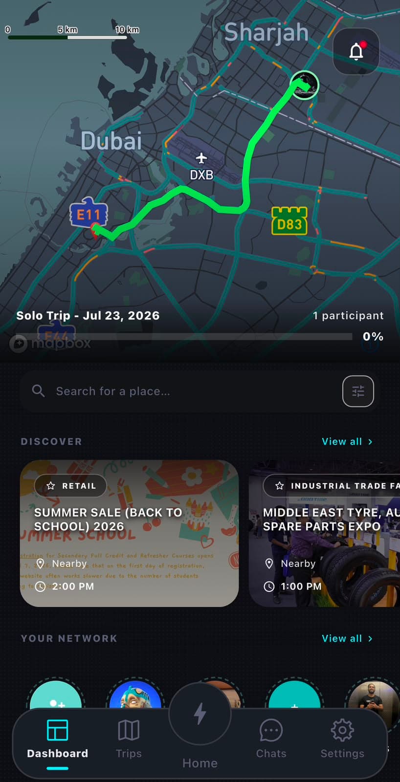 Zyncers solo trip dashboard showing a live route on the map, trip progress and nearby discovery cards
